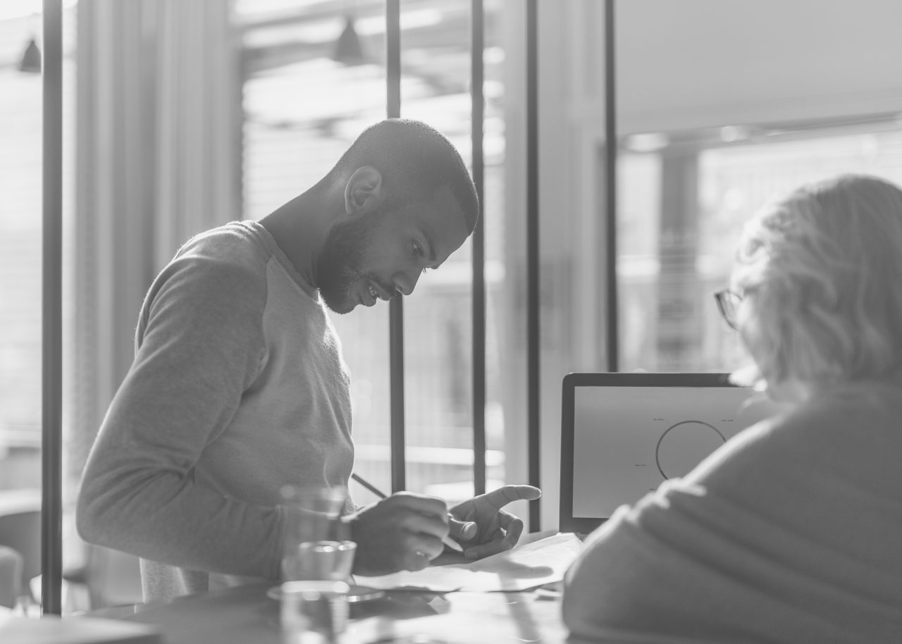 Two young business people working on a project